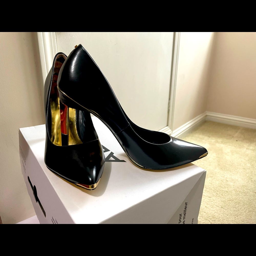 Black and gold heels